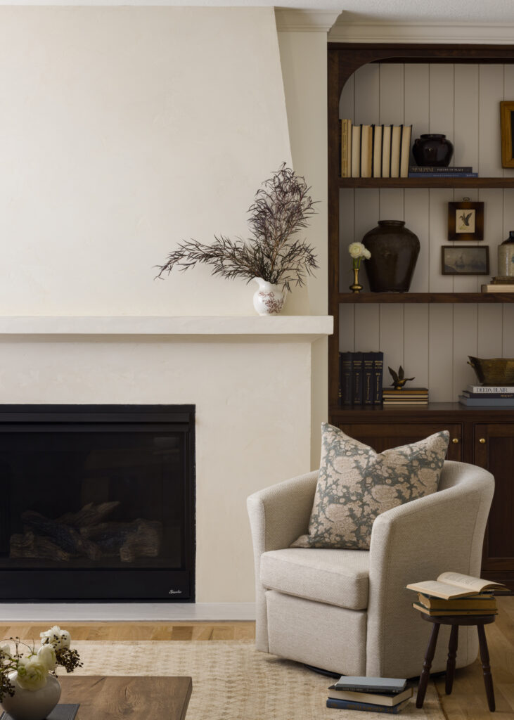 Fireplace renovation and makeover from outdated to plaster fireplace by remodel and interior design team in Kansas City