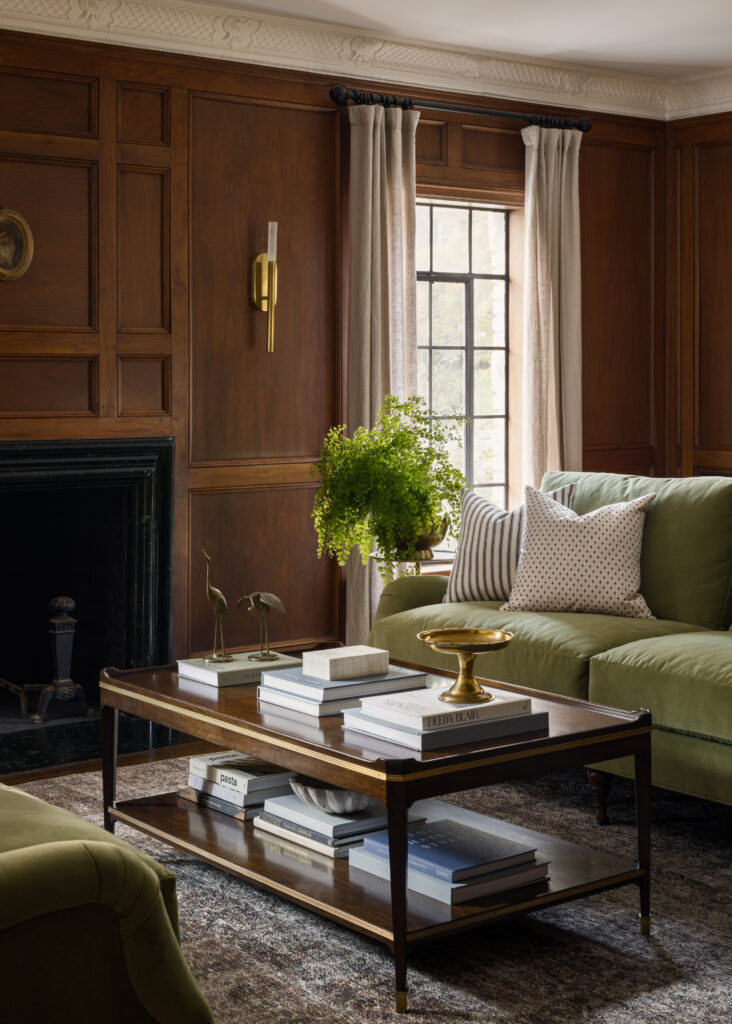 Wood paneled living room with mix of modern and traditional styles.